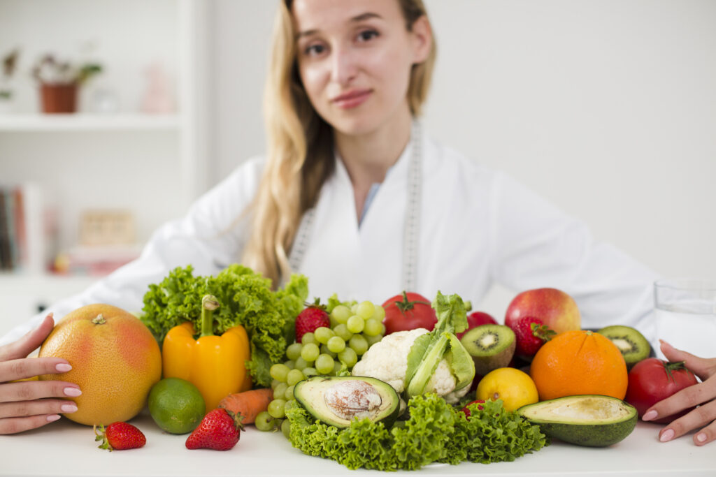 A vibrant plate of fresh raw fruits, vegetables, and nuts, showcasing nature's purest ingredients to Unleash Health Benefits of Raw Food.